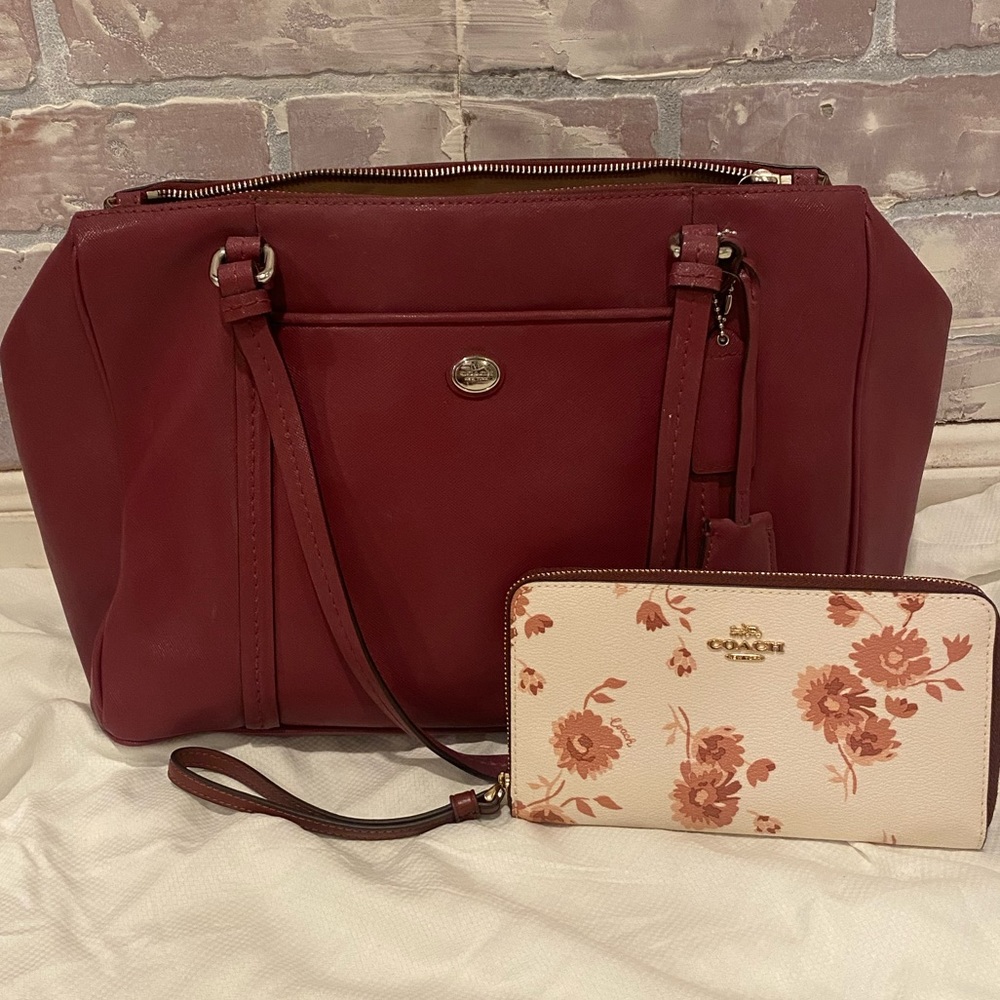 Maroon Coach tote with coordinating floral wristlet